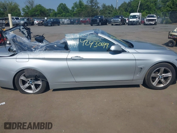 2014 BMW 4 Series 428i with VIN WBA3V7C55EJ873028, listed as a IAAI auction lot 42432699 with 24,063 mi miles and . Bid and sale history available at DreamBid. Image 14.