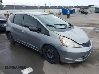 2009 Honda Fit with VIN JHMGE88279S055565, listed as a IAAI auction lot 41896359 with 184,618 mi miles. Bid and sale history available at carsss.com. Image 1.