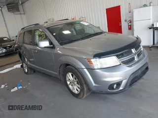 2015 Dodge Journey SXT with VIN 3C4PDCBG1FT587061, listed as a IAAI auction lot 42186693 with 186,551 mi miles and . Bid and sale history available at DreamBid. Image 1.