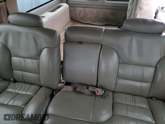 1999 Chevrolet Suburban with VIN 1GNFK16R7XJ402741, listed as a Copart auction lot 73283404 with 143,943 mi miles and Salvage Title. Bid and sale history available at carsss.com. Image 10.