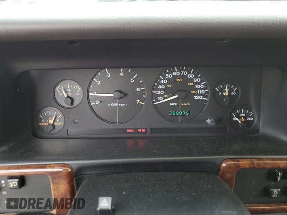 1997 Jeep Grand Cherokee Laredo with VIN 1J4GZ58S3VC739922, listed as a Copart auction lot 55667885 with 209,075 mi miles and Salvage title. Bid and sale history available at DreamBid. Image 9.