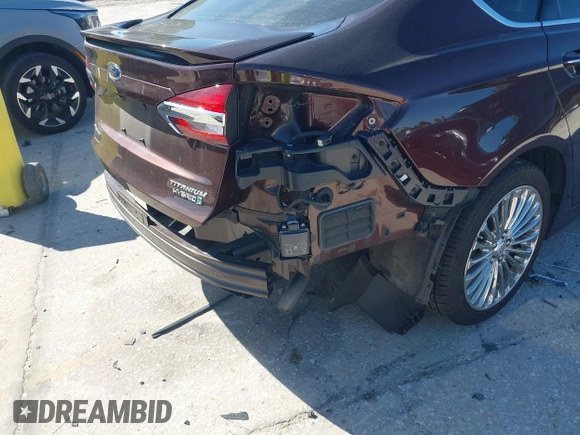 2019 Ford Fusion Hybrid Titanium with VIN 3FA6P0RU2KR123786, listed as a IAAI auction lot 41857026 with 49,604 mi miles. Bid and sale history available at carsss.com. Image 21.