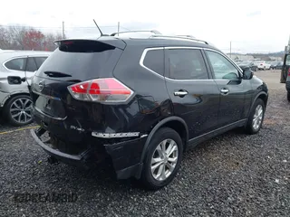 2016 Nissan Rogue SV with VIN KNMAT2MV9GP629576, listed as a IAAI auction lot 41780290 with 129,089 mi miles. Bid and sale history available at carsss.com. Image 4.