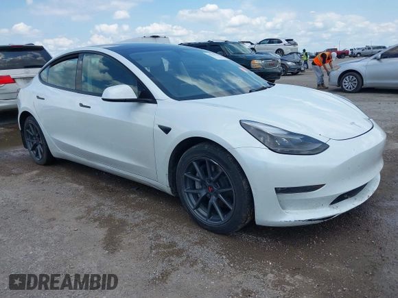 2023 Tesla Model 3 with VIN 5YJ3E1EA5PF407054, listed as a IAAI auction lot 42313770 with 57,621 mi miles and . Bid and sale history available at DreamBid. Image 1.