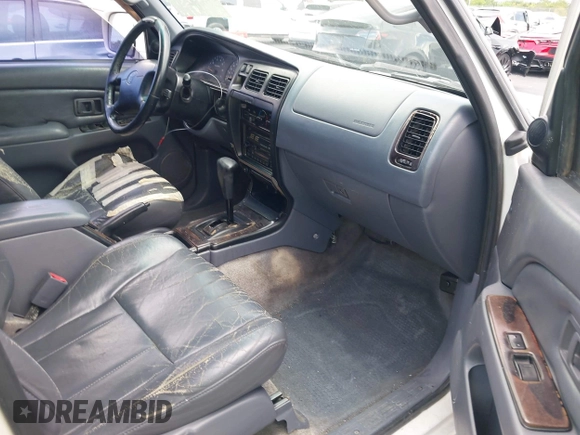1998 Toyota 4Runner SR5 z VIN JT3GN86R5W0060650, wystawiony jako IAAI lot #42373192 z przebiegiem 264 886 mil mil oraz . Historia ofert i sprzedaży dostępna na DreamBid. Obrazek 5.