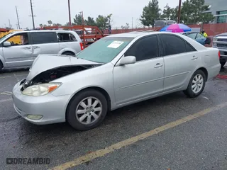 2004 Toyota Camry LE with VIN 4T1BF32K84U589638, listed as a IAAI auction lot 41571339 with 90,311 mi miles. Bid and sale history available at carsss.com. Image 17.