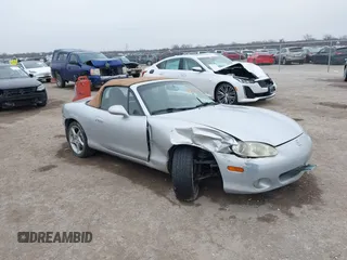 2002 Mazda MX-5 Miata Cloth z VIN JM1NB353520233203, wystawiony jako IAAI lot #41487272 z przebiegiem 223 253 mil mil oraz . Historia ofert i sprzedaży dostępna na DreamBid. Obrazek 1.