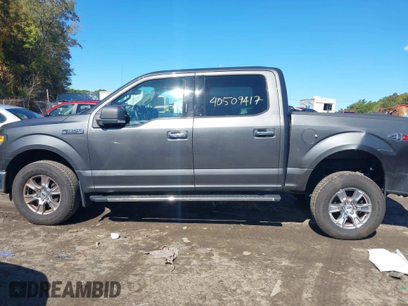 2015 Ford F-150 XLT with VIN 1FTEW1EF7FFB65198, listed as a IAAI auction lot 40509417 with 119,649 mi miles and . Bid and sale history available at DreamBid. Image 15.