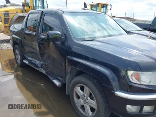 2011 Honda Ridgeline RTL with VIN 5FPYK1F54BB011472, listed as a IAAI auction lot 42112512 with 194,974 mi miles and . Bid and sale history available at DreamBid. Image 6.
