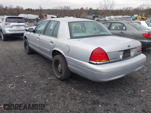 2003 Ford Crown Victoria LX z VIN 2FAFP74W53X151974, wystawiony jako IAAI lot #40887020 z przebiegiem 186 149 mil mil oraz . Historia ofert i sprzedaży dostępna na DreamBid. Obrazek 3.