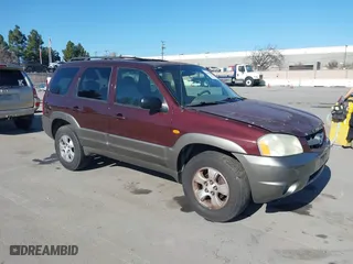2001 Mazda Tribute LX with VIN 4F2YU08131KM39817, listed as a IAAI auction lot 41678877 with 210,715 mi miles. Bid and sale history available at carsss.com. Image 1.