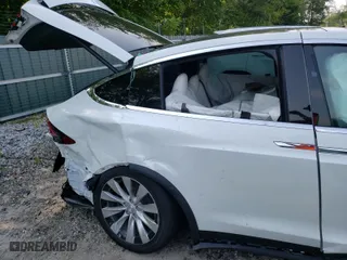 2020 Tesla Model X Long Range with VIN 5YJXCDE2XLF263903, listed as a Copart auction lot 52931311 with 0 mi miles and Salvage Title. Bid and sale history available at carsss.com. Image 6.