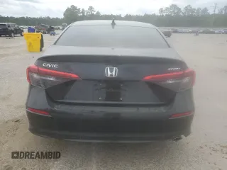 2023 Honda Civic Sport z VIN 2HGFE2F57PH520634, wystawiony jako Copart lot #51852665 z przebiegiem 52 641 mil mil oraz Szkoda całkowita • Salvage title. Historia ofert i sprzedaży dostępna na DreamBid. Obrazek 6.