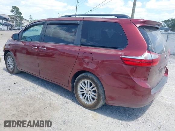 2016 Toyota Sienna XLE with VIN 5TDYK3DC7GS716470, listed as a IAAI auction lot 42177176 with 121,165 mi miles and . Bid and sale history available at DreamBid. Image 3.