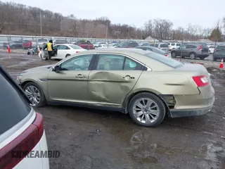 2012 Ford Taurus Limited z VIN 1FAHP2FW7CG128260, wystawiony jako IAAI lot #41640283 z przebiegiem 140 192 mil mil oraz . Historia ofert i sprzedaży dostępna na DreamBid. Obrazek 15.