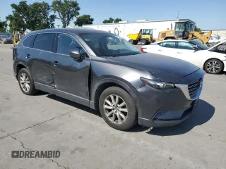 2016 Mazda CX-9 Touring with VIN JM3TCACY1G0108947, listed as a Copart auction lot 58562225 with 86,014 mi miles and Salvage title. Bid and sale history available at DreamBid. Image 4.