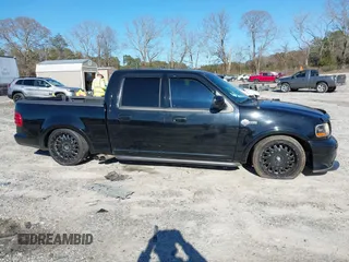 2002 Ford F-150 Harley Davidson with VIN 1FTRW07312KC24102, listed as a IAAI auction lot 41591917 with 1 mi miles. Bid and sale history available at carsss.com. Image 14.