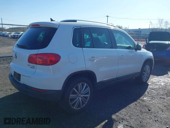 2013 Volkswagen Tiguan SE with VIN WVGBV7AX7DW511699, listed as a IAAI auction lot 41970908 with 164,758 mi miles and . Bid and sale history available at DreamBid. Image 4.