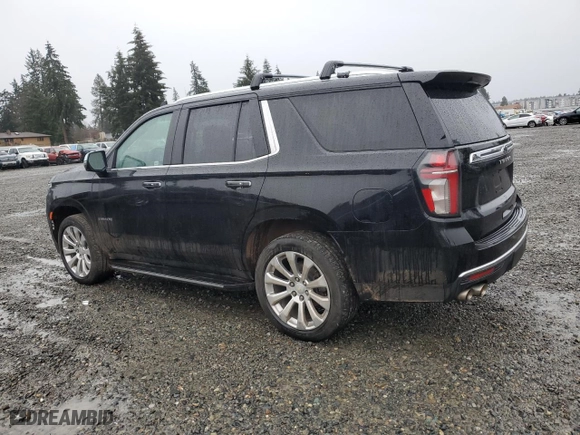 2021 Chevrolet Tahoe Premier with VIN 1GNSKSKD5MR231077, listed as a Copart auction lot 84274084 with 53,932 mi miles and Salvage Title. Bid and sale history available at carsss.com. Image 2.