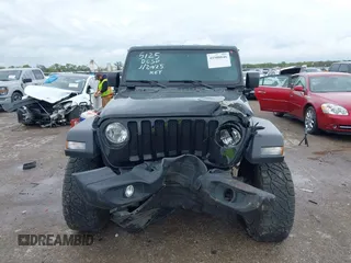 2022 Jeep Wrangler Unlimited Sport S z VIN 1C4HJXDG0NW133801, wystawiony jako IAAI lot #41908846 z przebiegiem 44 743 mil mil oraz . Historia ofert i sprzedaży dostępna na DreamBid. Obrazek 12.