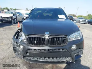 2016 BMW X5 M with VIN 5YMKT6C51G0R79331, listed as a IAAI auction lot 40590865 with 80,772 mi miles. Bid and sale history available at carsss.com. Image 12.