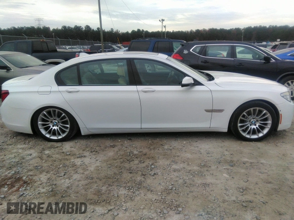 2015 BMW 7 Series 750Li with VIN WBAYE8C50FD781160, listed as a IAAI auction lot 41061232 with 154,496 mi miles. Bid and sale history available at carsss.com. Image 13.