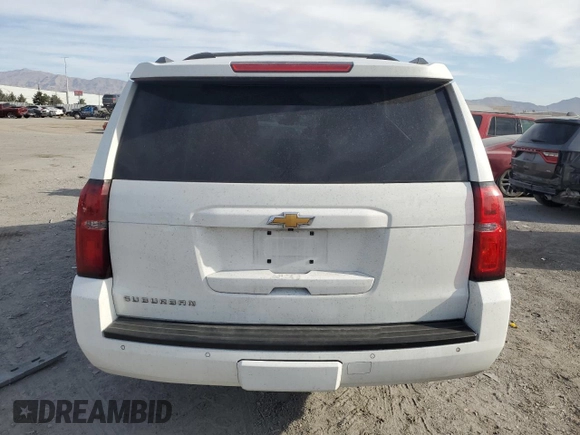 2015 Chevrolet Suburban LT with VIN 1GNSKJKC4FR691285, listed as a Copart auction lot 53137615 with 225,415 mi miles and Salvage Title. Bid and sale history available at DreamBid. Image 6.