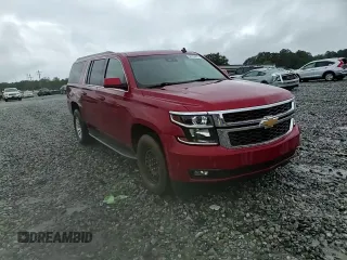 2015 Chevrolet Suburban LT with VIN 1GNSCJKC2FR306223, listed as a Copart auction lot 58733475 with 191,330 mi miles and Salvage title. Bid and sale history available at DreamBid. Image 14.