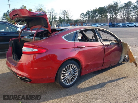 2014 Ford Fusion Titanium with VIN 3FA6P0K97ER145700, listed as a IAAI auction lot 42056362 with 122,000 mi miles. Bid and sale history available at carsss.com. Image 4.