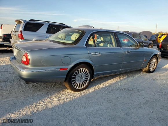 2005 Jaguar XJ VDP with VIN SAJWA82C65SG45247, listed as a Copart auction lot 77950594 with NaN miles and Salvage Title. Bid and sale history available at carsss.com. Image 3.
