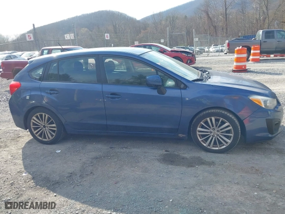 2012 Subaru Impreza Wagon 2.0i Premium with VIN JF1GPAD6XCH212222, listed as a IAAI auction lot 41899489 with 136,410 mi miles. Bid and sale history available at carsss.com. Image 13.