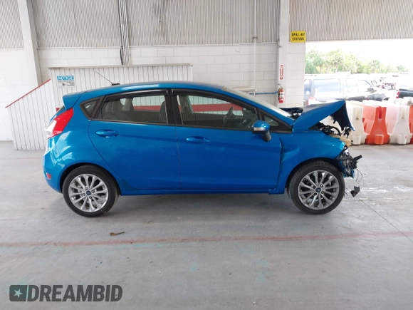 2014 Ford Fiesta SE with VIN 3FADP4EJ7EM204438, listed as a IAAI auction lot 42098291 with 184,930 mi miles and . Bid and sale history available at DreamBid. Image 14.