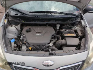 2013 Kia Rio EX with VIN KNADN4A38D6165846, listed as a Copart auction lot 61472955 with 180,536 mi miles and Salvage title. Bid and sale history available at DreamBid. Image 11.