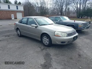 2003 Saturn LS with VIN 1G8JU54FX3Y550505, listed as a IAAI auction lot 41875313 with 211,073 mi miles. Bid and sale history available at carsss.com. Image 1.