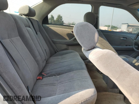 2001 Toyota Camry LE z VIN JT2BF22K010297055, wystawiony jako Copart lot #59510645 z przebiegiem 265 428 mil mil oraz Szkoda całkowita • Salvage title. Historia ofert i sprzedaży dostępna na DreamBid. Obrazek 10.