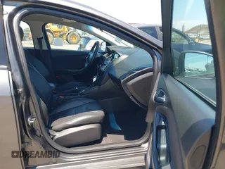 2016 Ford Focus SE z VIN 1FADP3F25GL329217, wystawiony jako IAAI lot #42461772 z przebiegiem 85 070 mil mil oraz . Historia ofert i sprzedaży dostępna na DreamBid. Obrazek 5.