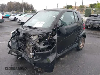 2012 Smart fortwo Pure z VIN WMEEJ3BA9CK521416, wystawiony jako IAAI lot #41847989 z przebiegiem Nie podano mil oraz . Historia ofert i sprzedaży dostępna na DreamBid. Obrazek 2.