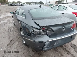 2014 Volkswagen CC Lux with VIN WVWRP7AN6EE520381, listed as a IAAI auction lot 41338169 with 130,363 mi miles. Bid and sale history available at carsss.com. Image 6.