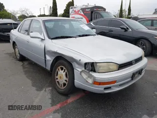 1994 Toyota Camry LE z VIN JT2GK12EXR0031351, wystawiony jako IAAI lot #41879230 z przebiegiem 265 810 mil mil oraz . Historia ofert i sprzedaży dostępna na DreamBid. Obrazek 1.