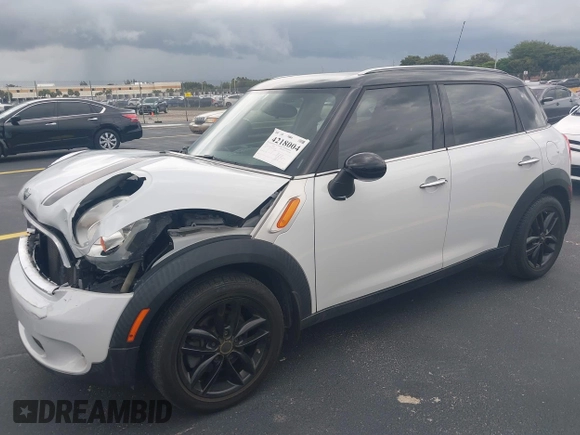 2012 MINI Countryman z VIN WMWZB3C56CWM04087, wystawiony jako IAAI lot #42180040 z przebiegiem 37 789 mil mil oraz . Historia ofert i sprzedaży dostępna na DreamBid. Obrazek 2.