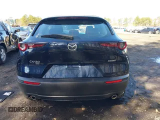2024 Mazda CX-30 S z VIN 3MVDMBAM8RM634233, wystawiony jako IAAI lot #41820443 z przebiegiem 8 540 mil mil oraz . Historia ofert i sprzedaży dostępna na DreamBid. Obrazek 16.