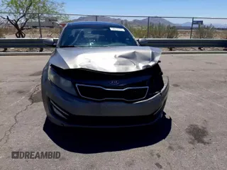 2012 Kia Optima SX z VIN 5XXGR4A60CG044520, wystawiony jako Copart lot #56013155 z przebiegiem 155 487 mil mil oraz Szkoda całkowita • Salvage title. Historia ofert i sprzedaży dostępna na DreamBid. Obrazek 11.