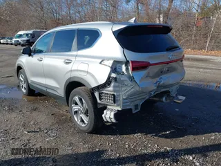 2021 Hyundai Santa Fe SE with VIN 5NMS1DAJ0MH322907, listed as a IAAI auction lot 41103803 with 58,046 mi miles. Bid and sale history available at carsss.com. Image 3.