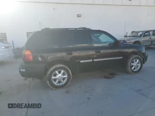 2005 GMC Envoy SLE with VIN 1GKDT13S452285975, listed as a Copart auction lot 46371785 with 358,411 mi miles and Salvage Title. Bid and sale history available at carsss.com. Image 3.