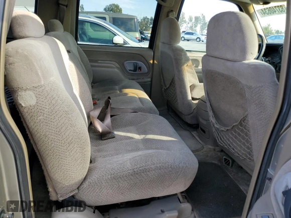 1999 GMC Suburban with VIN 3GKEC16R0XG526194, listed as a Copart auction lot 83740634 with 199,583 mi miles and Clean title. Bid and sale history available at DreamBid. Image 10.