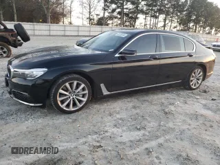 2017 BMW 7 Series 740i xDrive with VIN WBA7E4C55HGU99795, listed as a Copart auction lot 85545124 with 99,304 mi miles and Salvage Title. Bid and sale history available at carsss.com. Image 1.