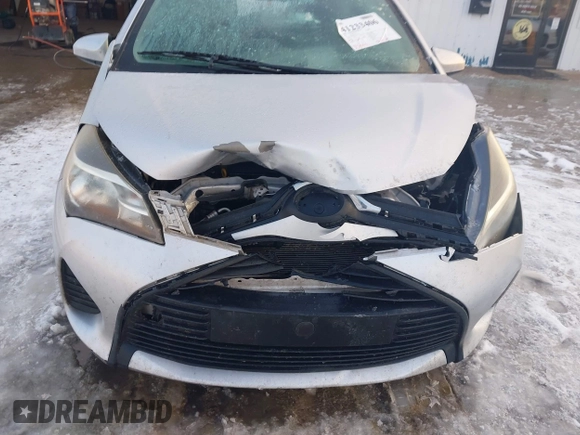 2015 Toyota Yaris L with VIN VNKJTUD36FA036518, listed as a IAAI auction lot 41233406 with 138,481 mi miles. Bid and sale history available at carsss.com. Image 6.