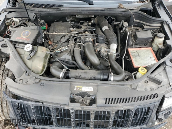 2014 Jeep Grand Cherokee Limited with VIN 1C4RJFBM1EC352484, listed as a Copart auction lot 57983305 with 157,143 mi miles and Salvage title. Bid and sale history available at DreamBid. Image 12.