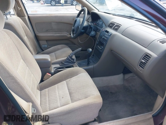 1999 Nissan Maxima GXE с VIN JN1CA21D4XT808080, выставлен на аукционе IAAI как лот 41948367 с пробегом 150 865 миль миль и . История ставок и продаж доступна на DreamBid. Изображение 5.