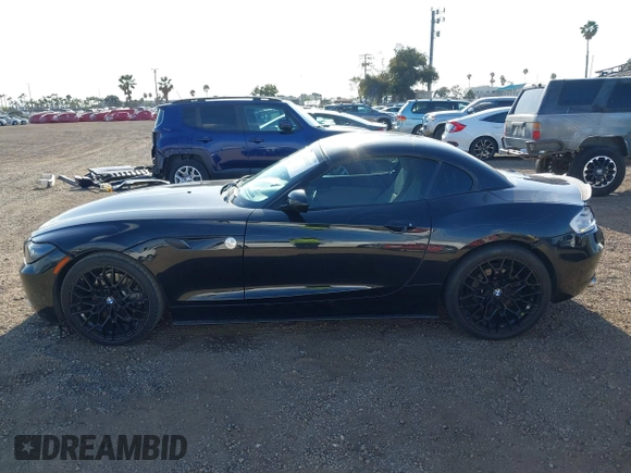 2012 BMW Z4 sDrive28i z VIN WBALL5C56CE716558, wystawiony jako IAAI lot #42065347 z przebiegiem 93 438 mil mil oraz . Historia ofert i sprzedaży dostępna na DreamBid. Obrazek 13.